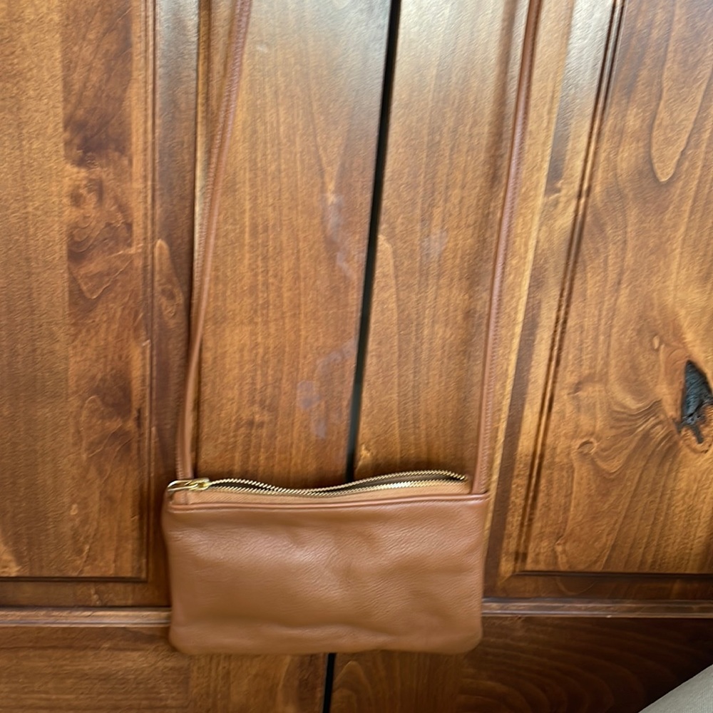 The umbrella collective micro crossbody with custom card slots. Perfect
